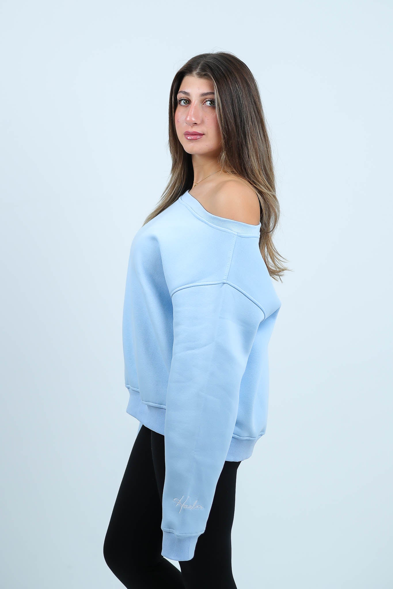 THE STITCHED SWAY OFFSHOULDER TOP