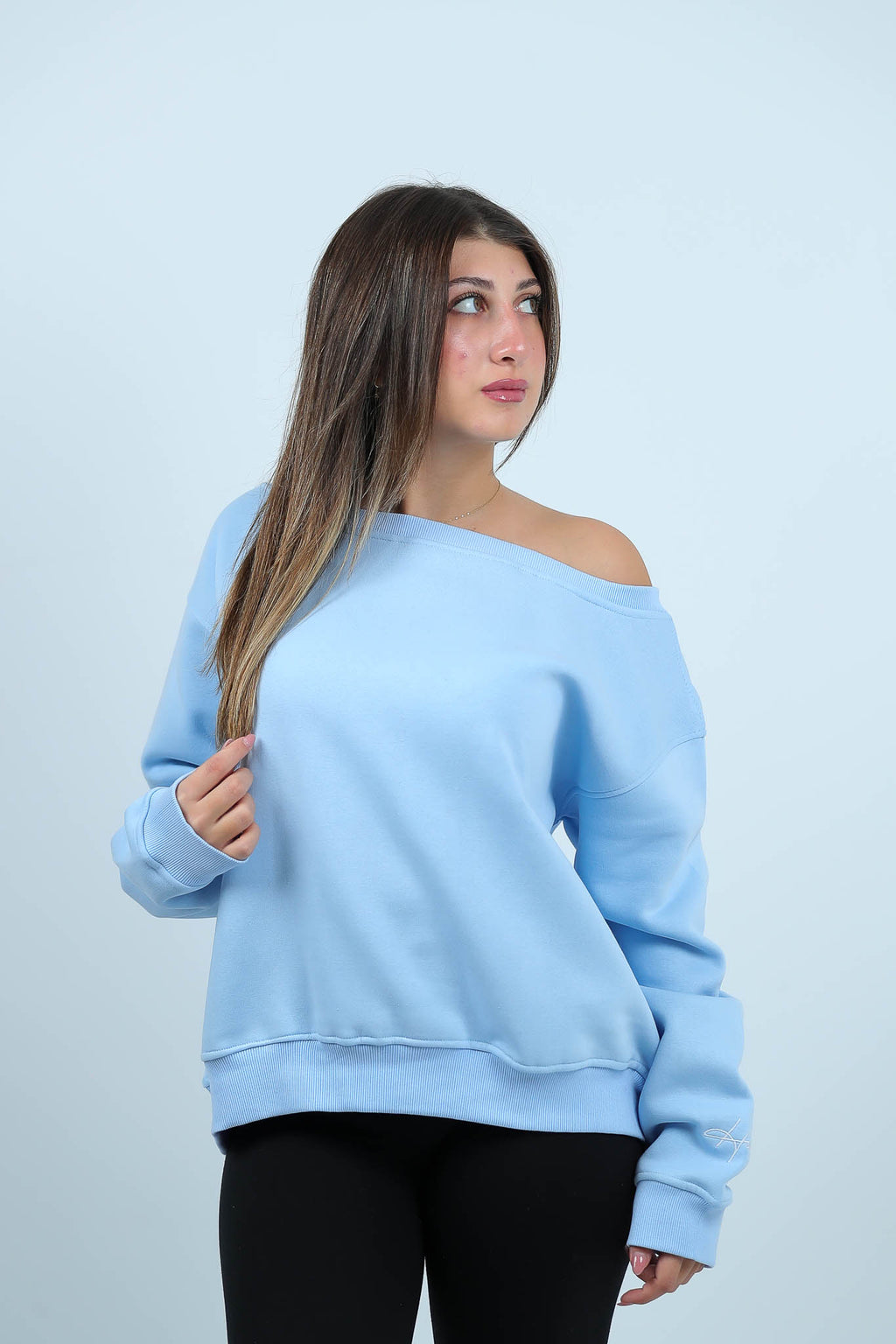 THE STITCHED SWAY OFFSHOULDER TOP
