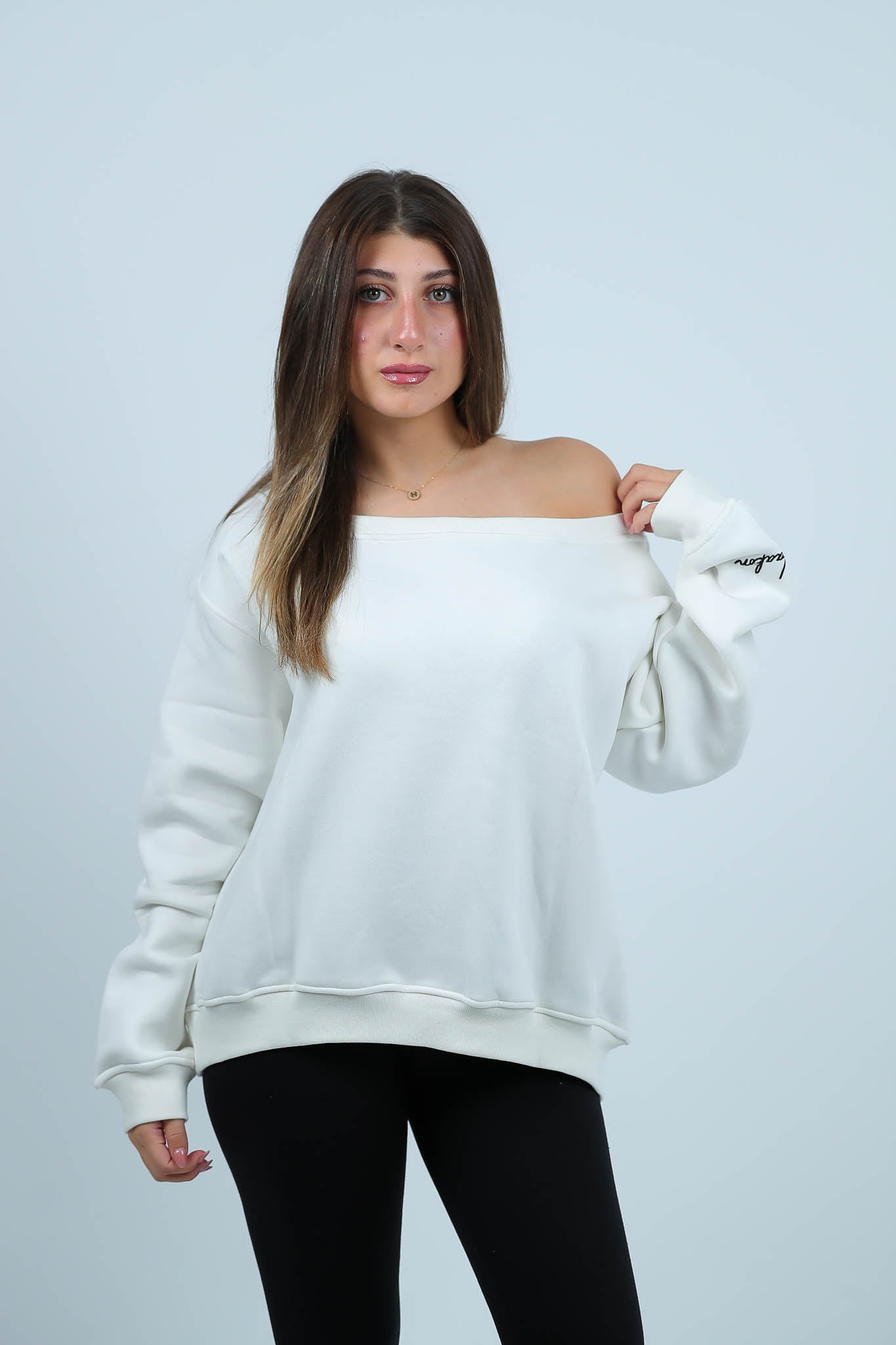 THE STITCHED SWAY OFFSHOULDER TOP