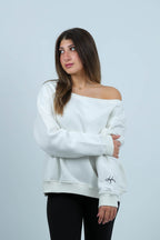 THE STITCHED SWAY OFFSHOULDER TOP