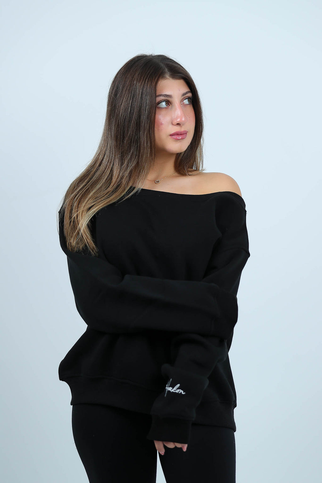 THE STITCHED SWAY OFFSHOULDER TOP