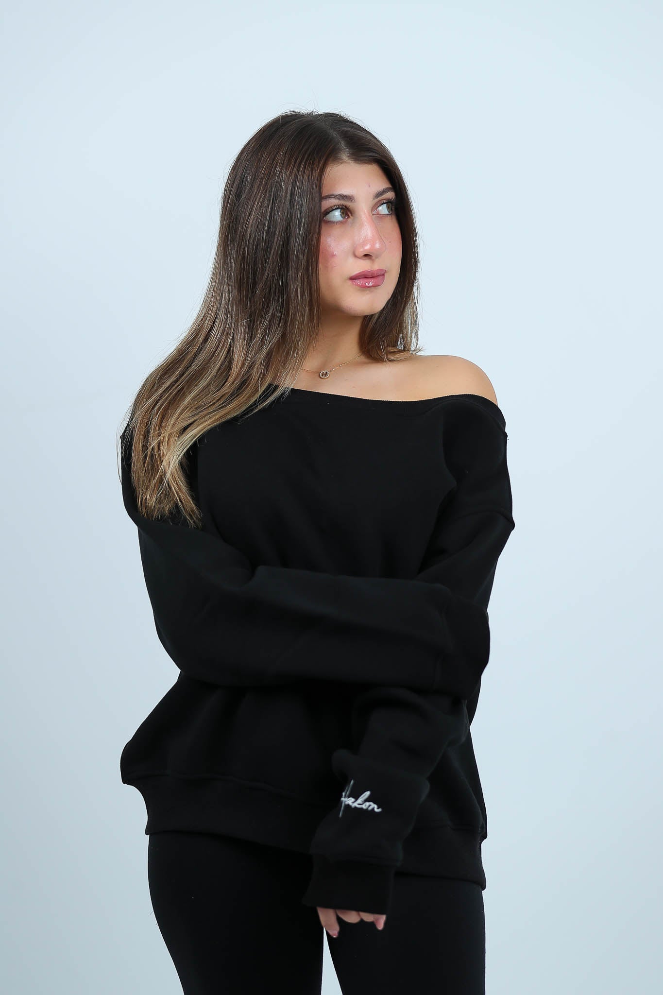 THE STITCHED SWAY OFFSHOULDER TOP